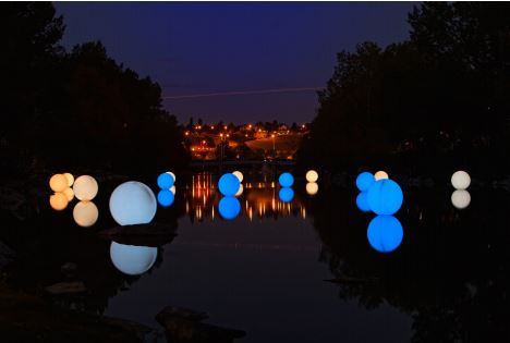Illuminated spheres on Bow River